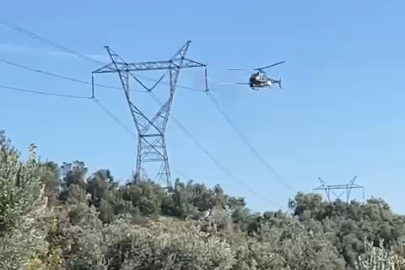 Bursa'da yüksek gerilim hatları helikopterle temizlendi