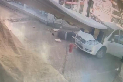 Bursa'da  alışveriş yaptıktan sonra otomobilin altında kaldı