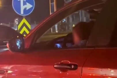 Bursa'da kucağında çocukla araç kullandı